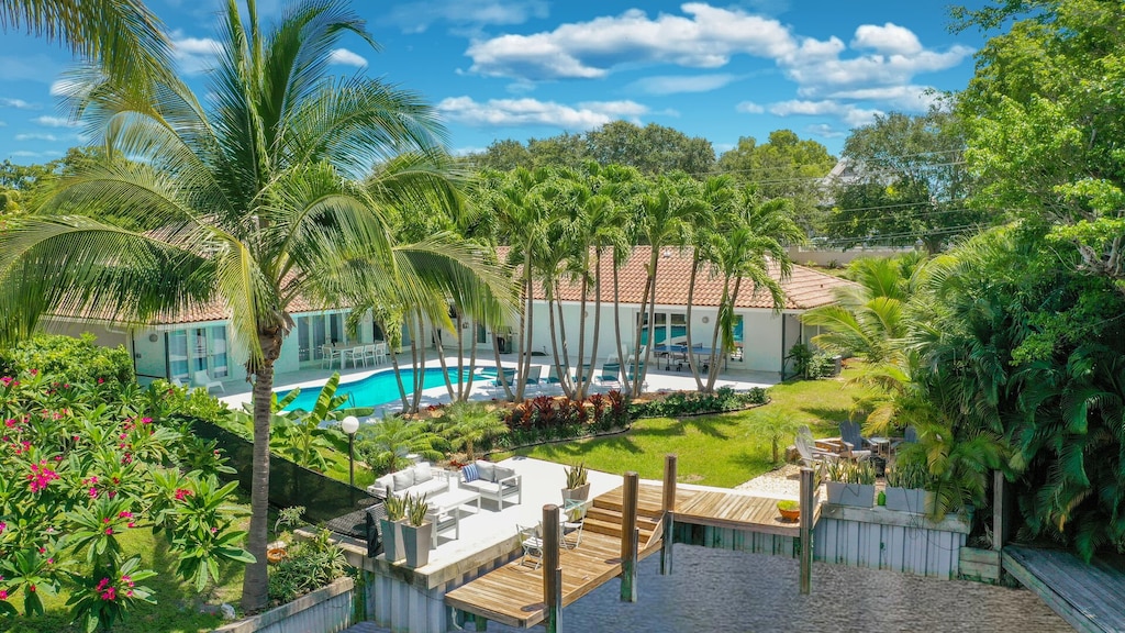 Private yard, waterside location.