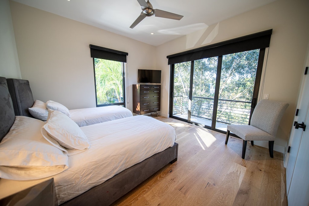 Bedroom 4 has patio doors with a lovely view
