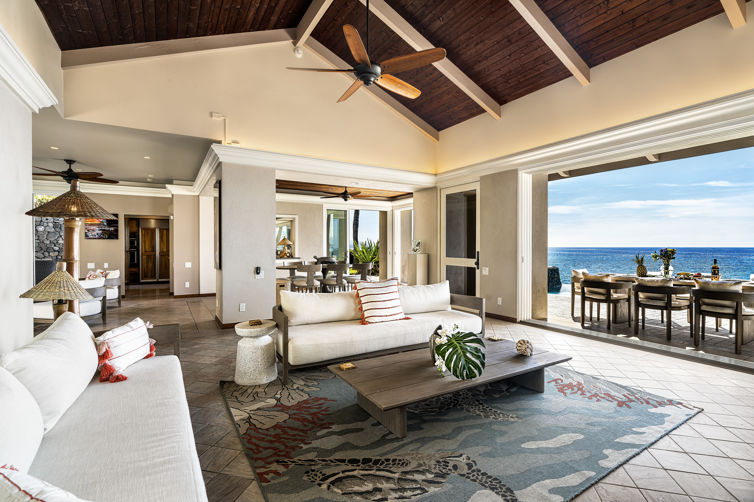 Vaulted ceilings with large sliding doors make this room spectacular