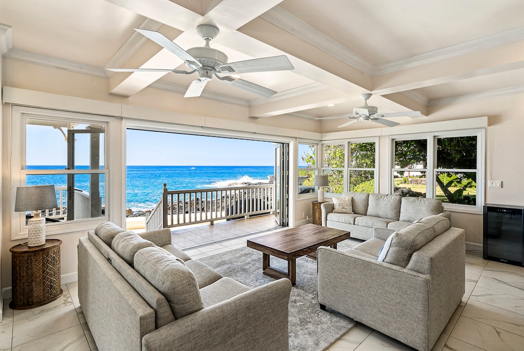 Living room equipped with 2 Queen sleeper sofas and a beautiful sea view.