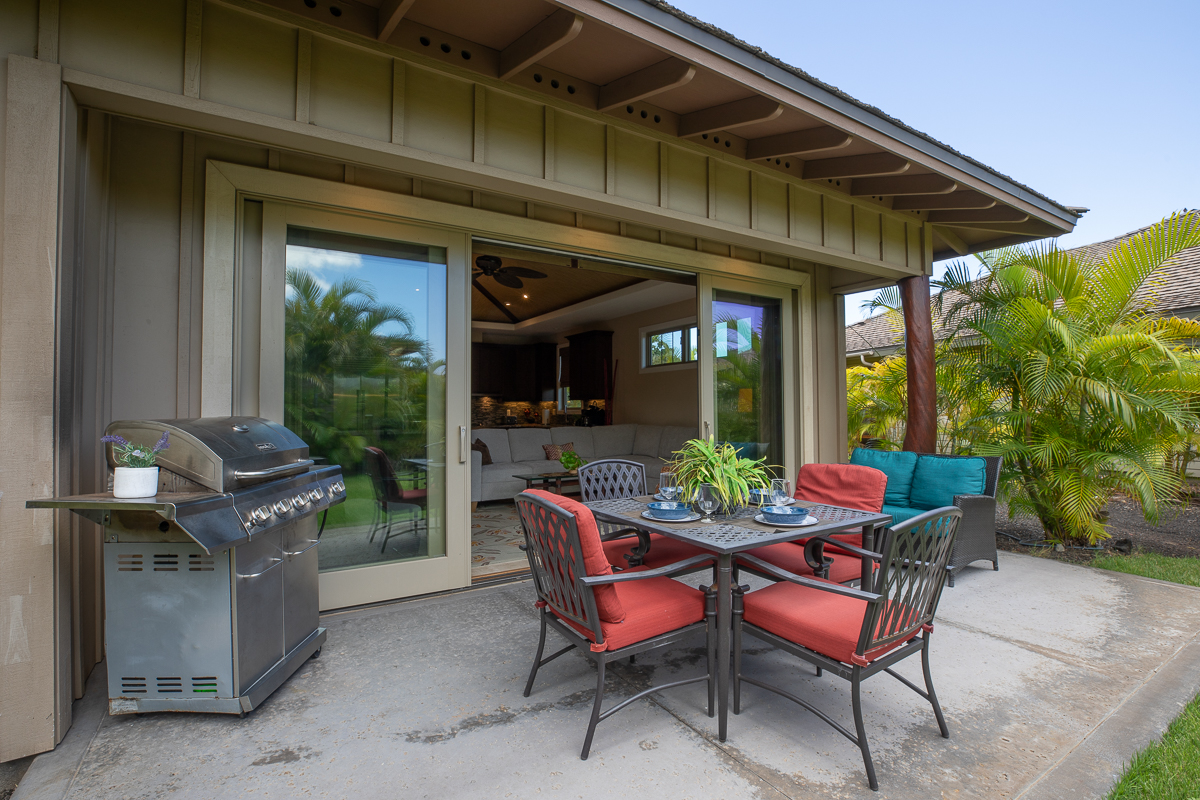 Barbecue grill and outdoor living/dining area.