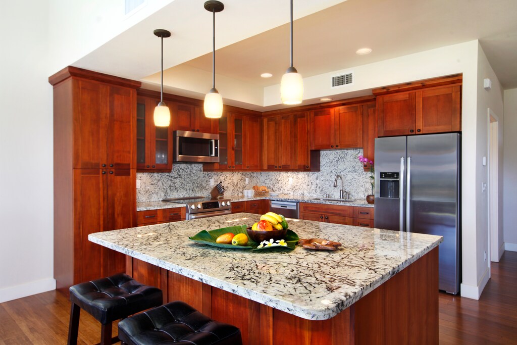 Create delicious memories in this sleek, island-style kitchen.