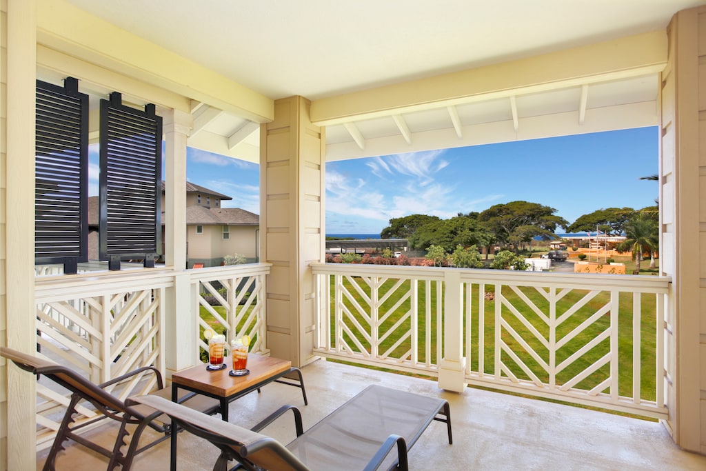 Sip and soak in serene tropical views at the lanai.