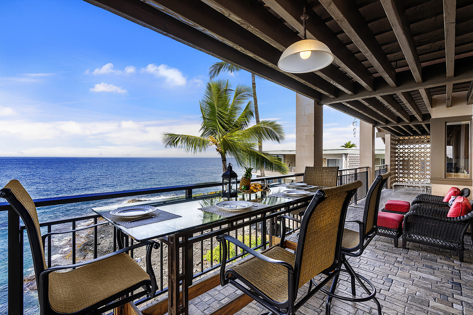 Dine on the ocean daily in this top floor condo!