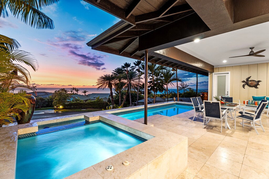 Unwind in the private pool and spa with stunning island views.