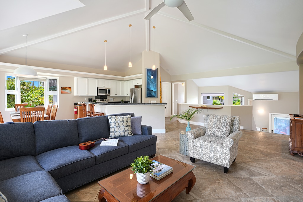 Gather with loved ones in the open-concept living room and kitchen, designed for relaxation and connection.