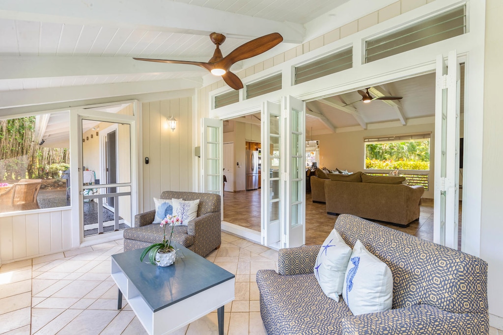 Relax on the covered lanai at Mala Hale, with seamless indoor-outdoor flow