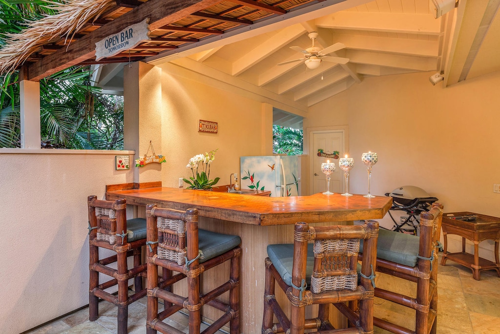 Tiki bar at sunset, the perfect spot for casual evening cocktails in your own private resort-style courtyard.