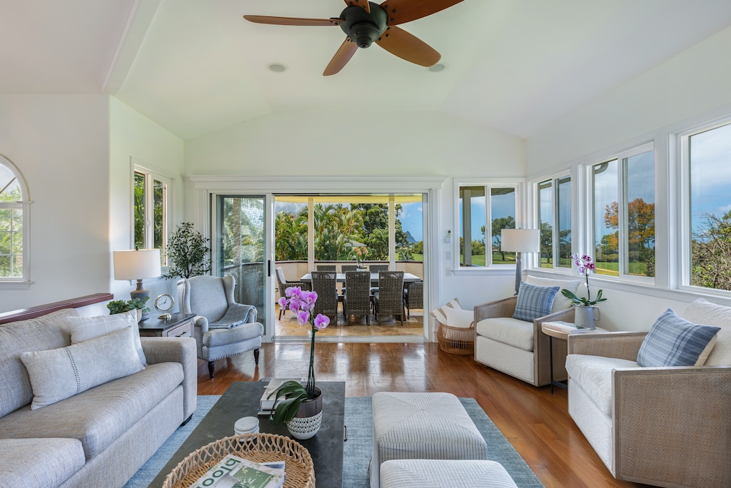 Bright and spacious living room with plush seating, perfect for group gatherings or winding down after island adventures.