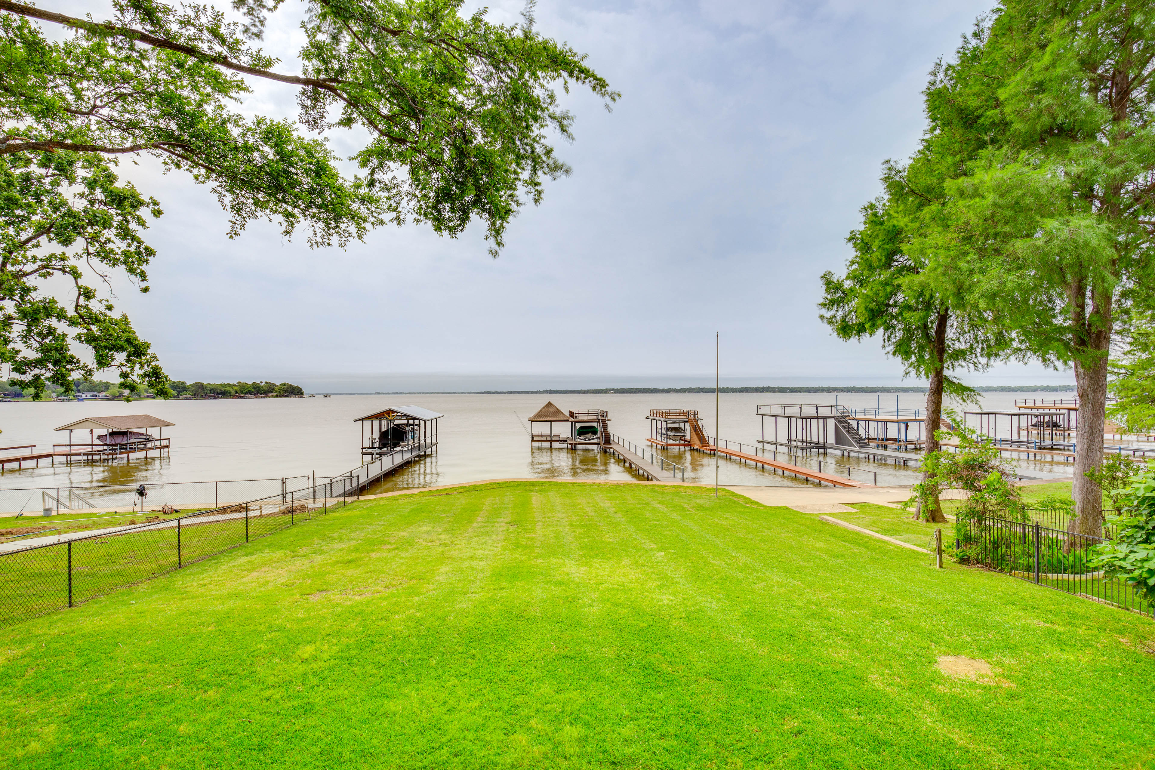 Property Image 1 - Lakefront Cedar Creek Home w/ Dock + Game Room!