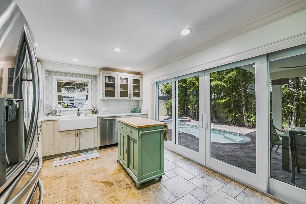 Kitchen with patio and pool access