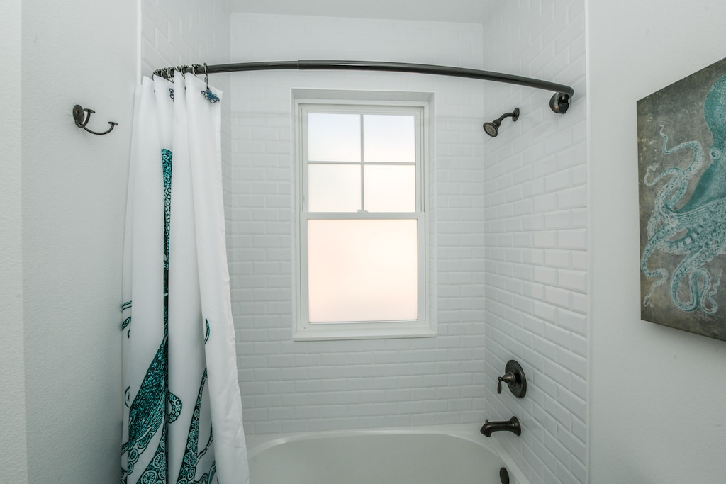 Fifth Bathroom with a tub/shower combo