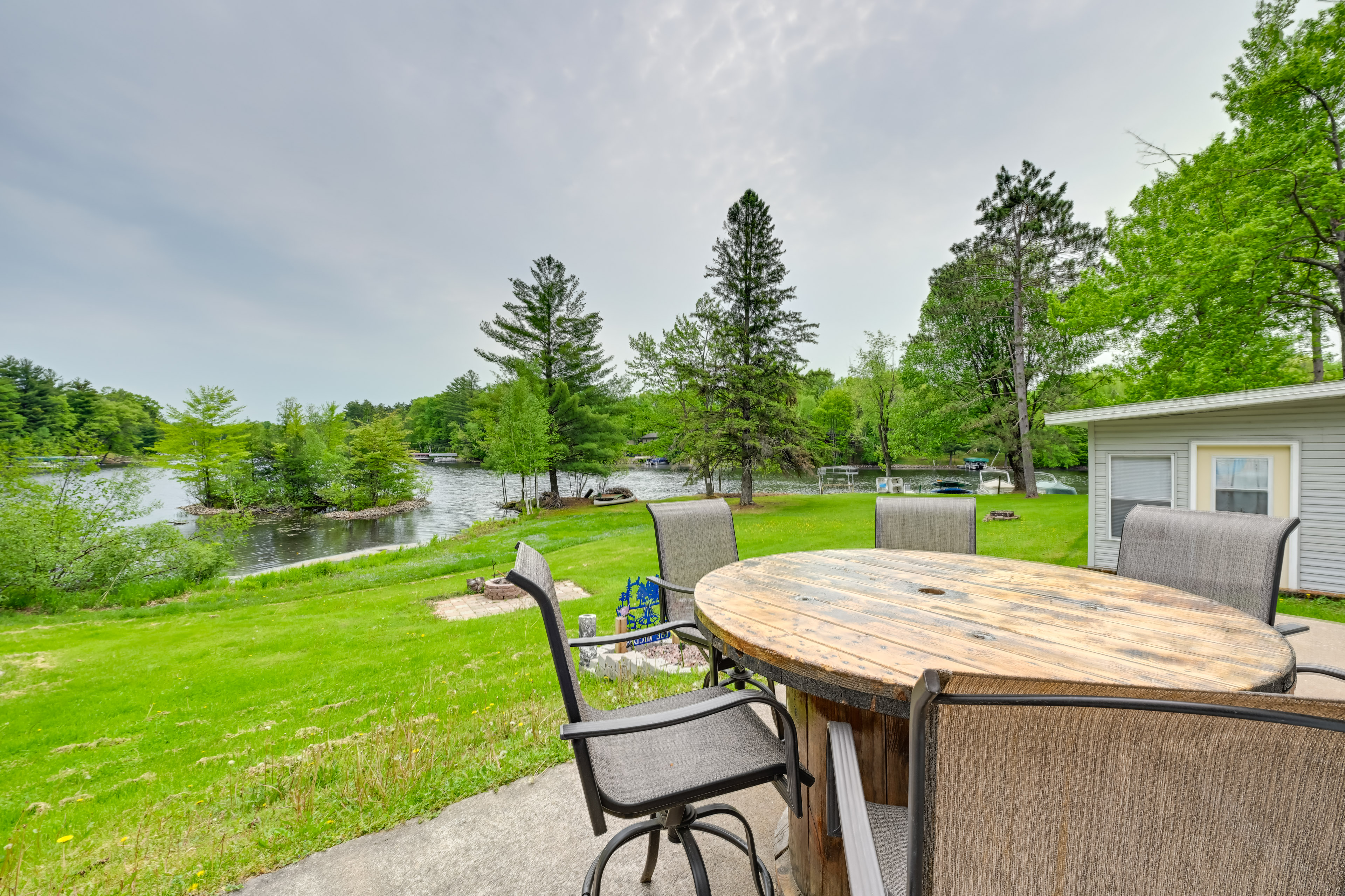 Property Image 2 - Lakeside Cabin w/ Fire Pit: Near Pine Point Park!