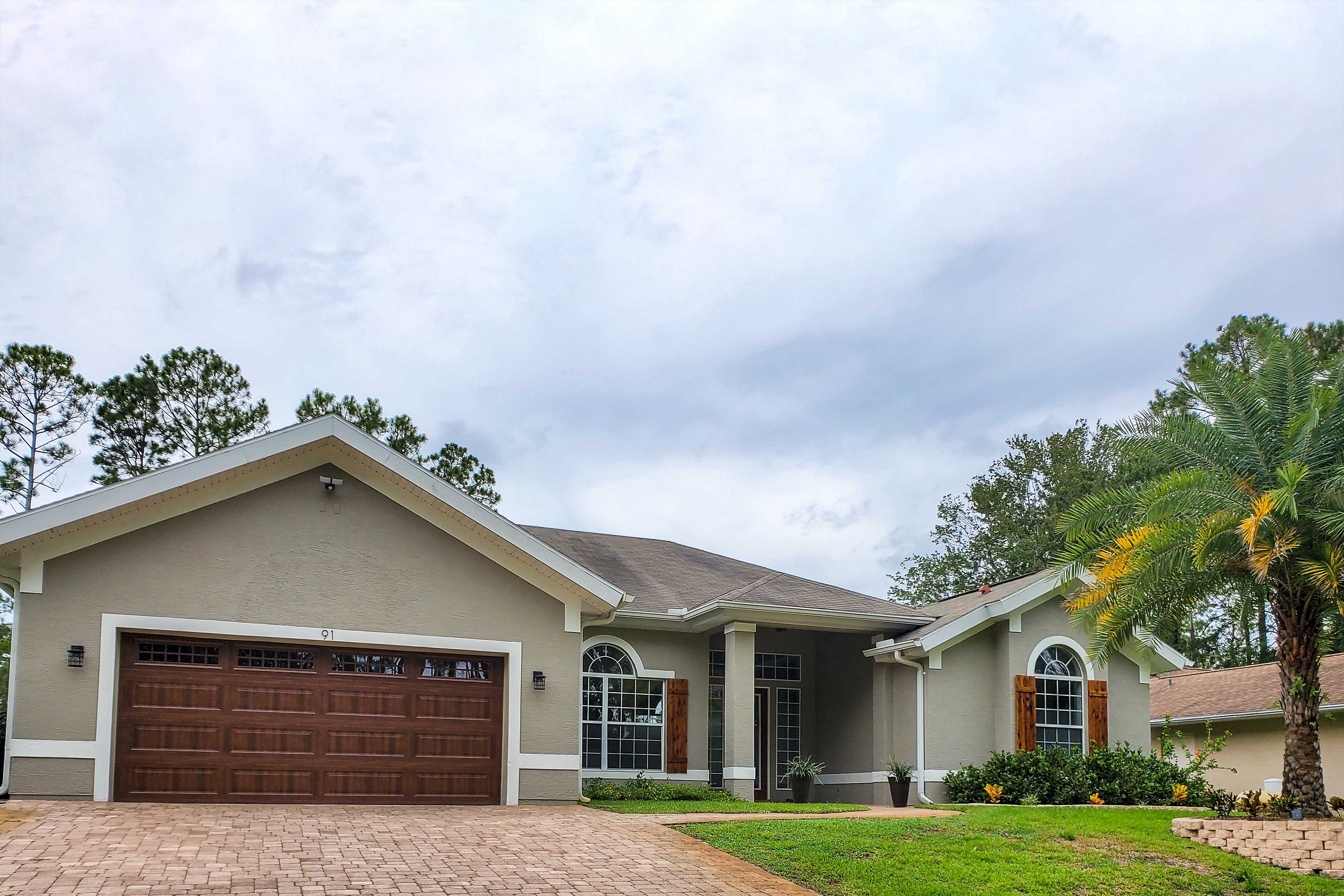 Property Image 1 - Upscale Palm Coast Home w/ Pool: 7 Mi to Beaches!