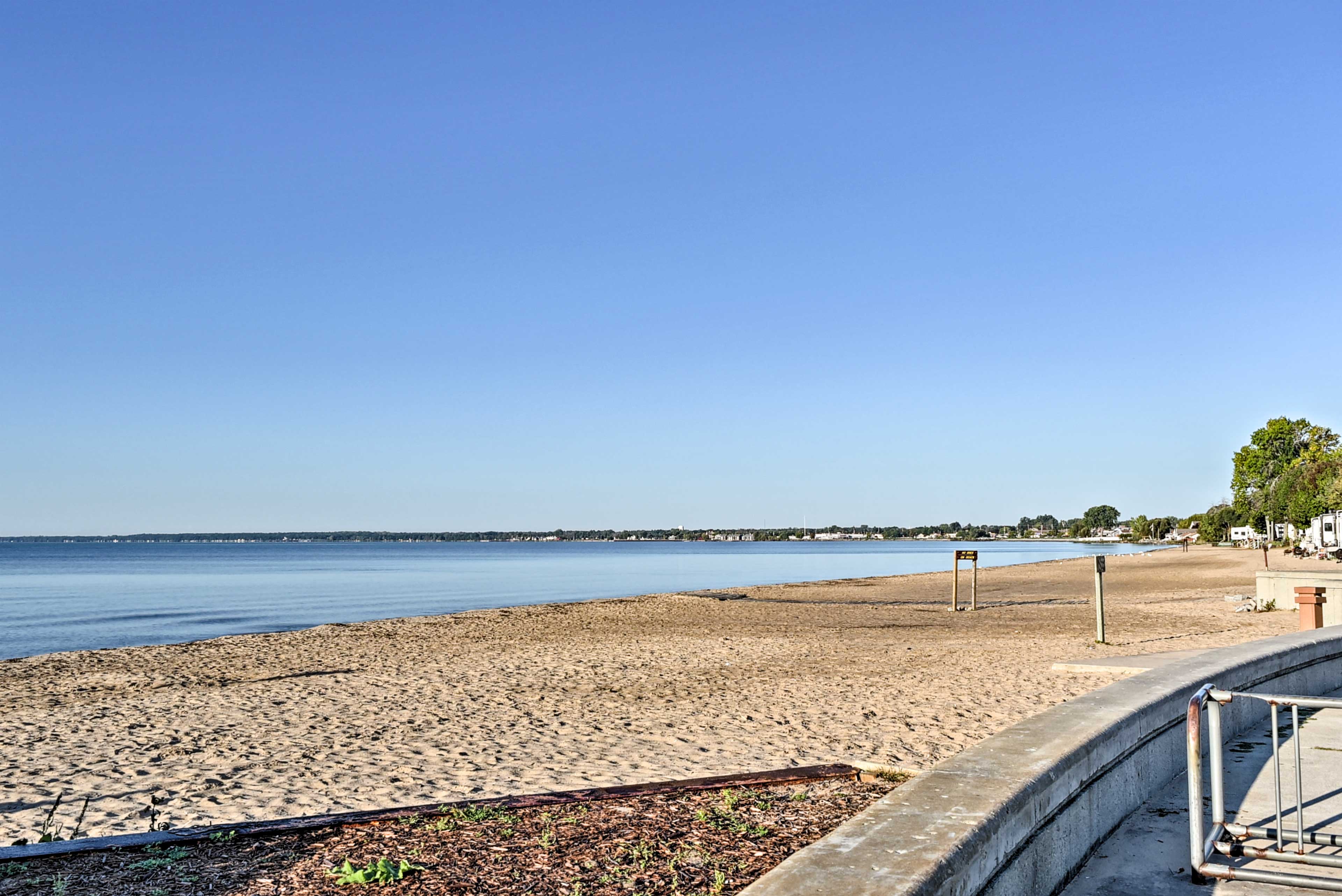 Walk to Lake Huron: Central East Tawas Apt!