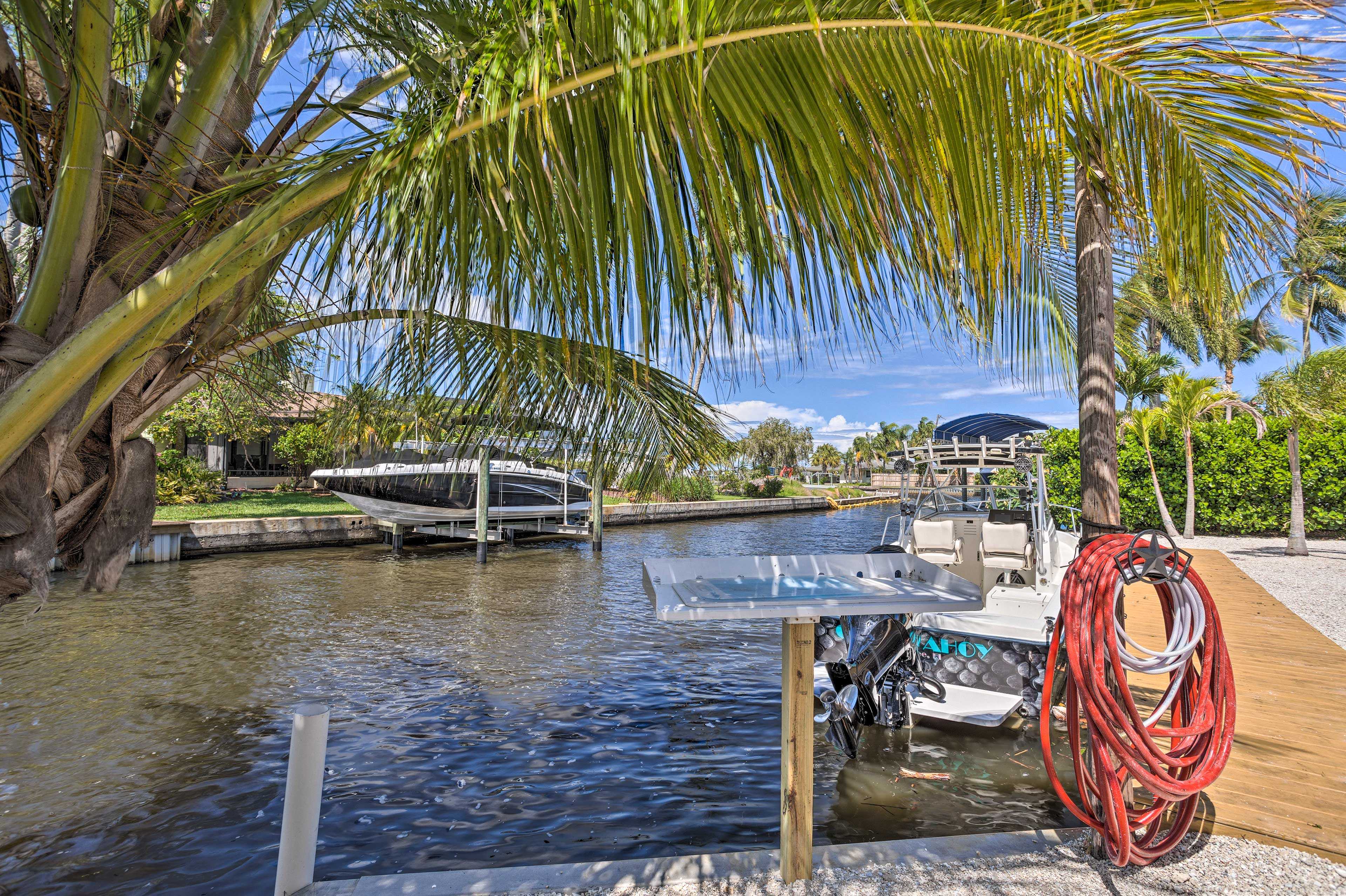 Property Image 1 - Palm City Canalfront Home w/ Tiki Hut & Dock!