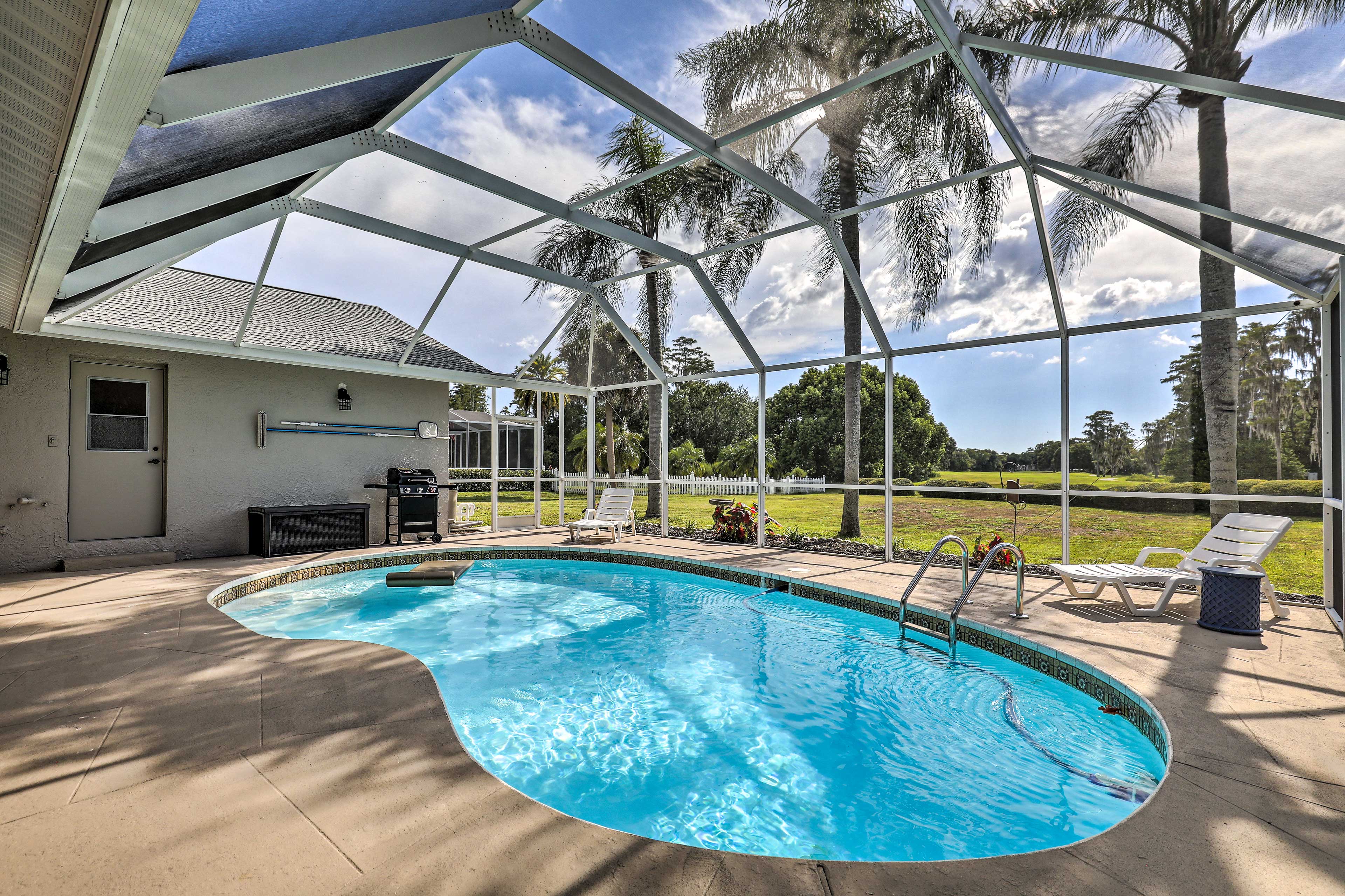 Property Image 1 - Palm Harbor Home w/ Pool & Golf Course Views!
