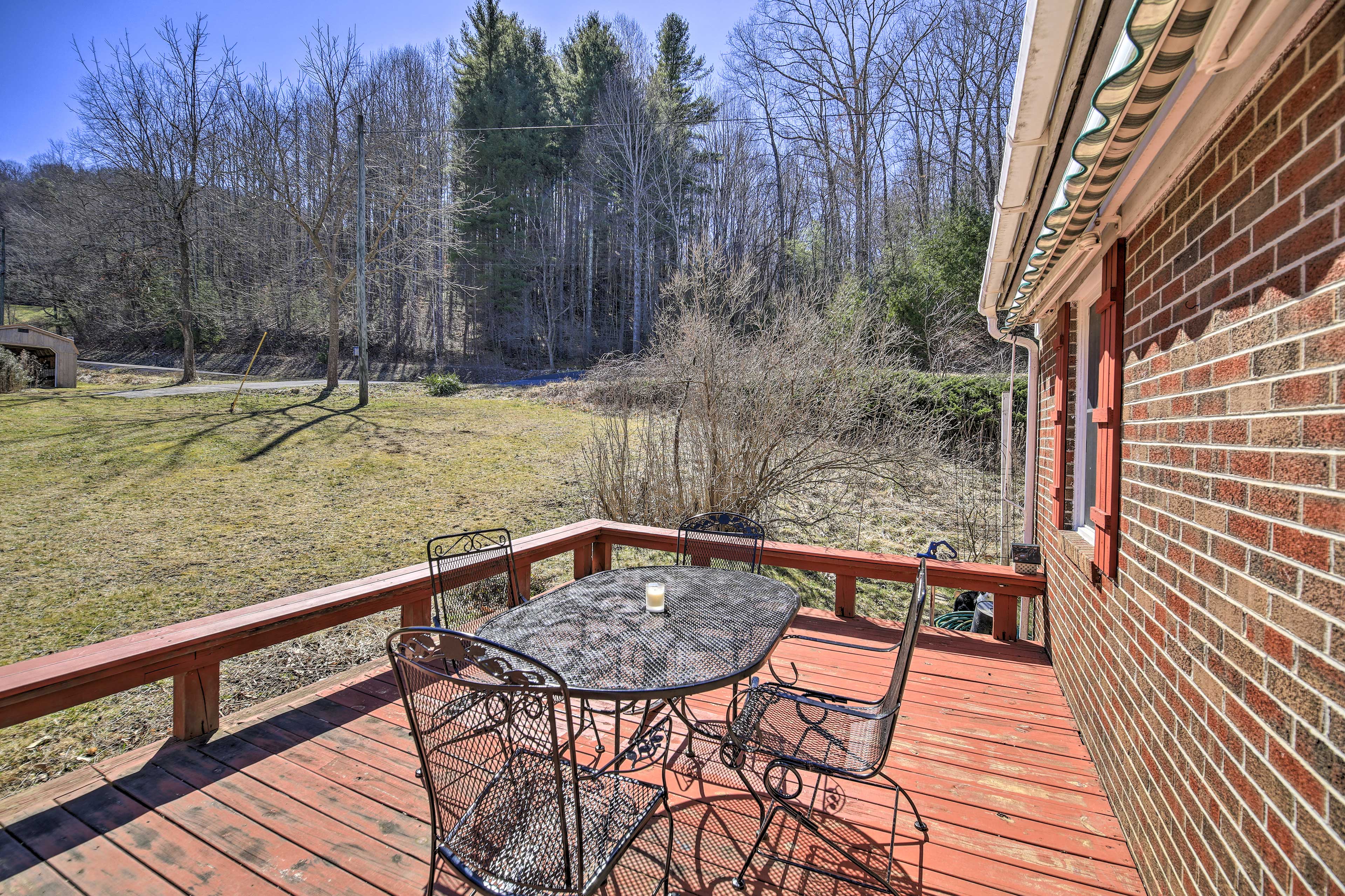 Quaint Creekside Home w/ Spacious Deck & Yard