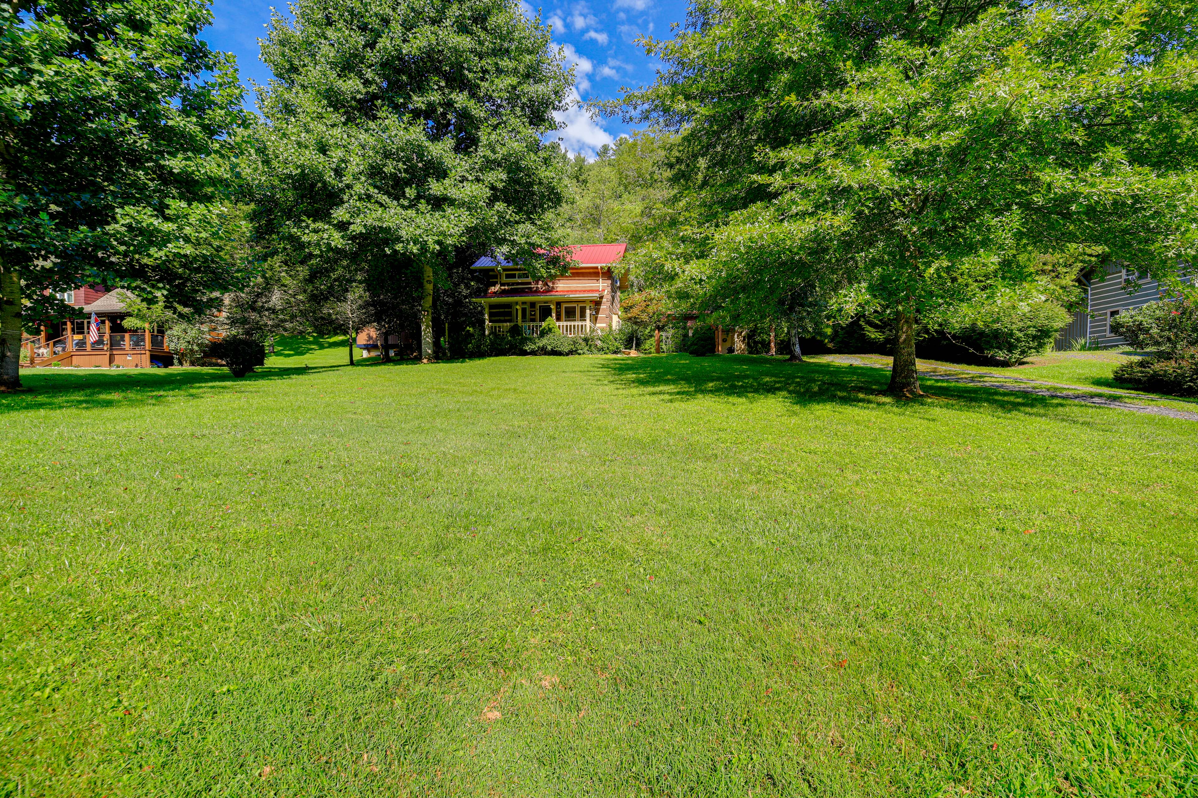 Property Image 1 - Riverfront Idyllic Lansing Home w/ Porch!