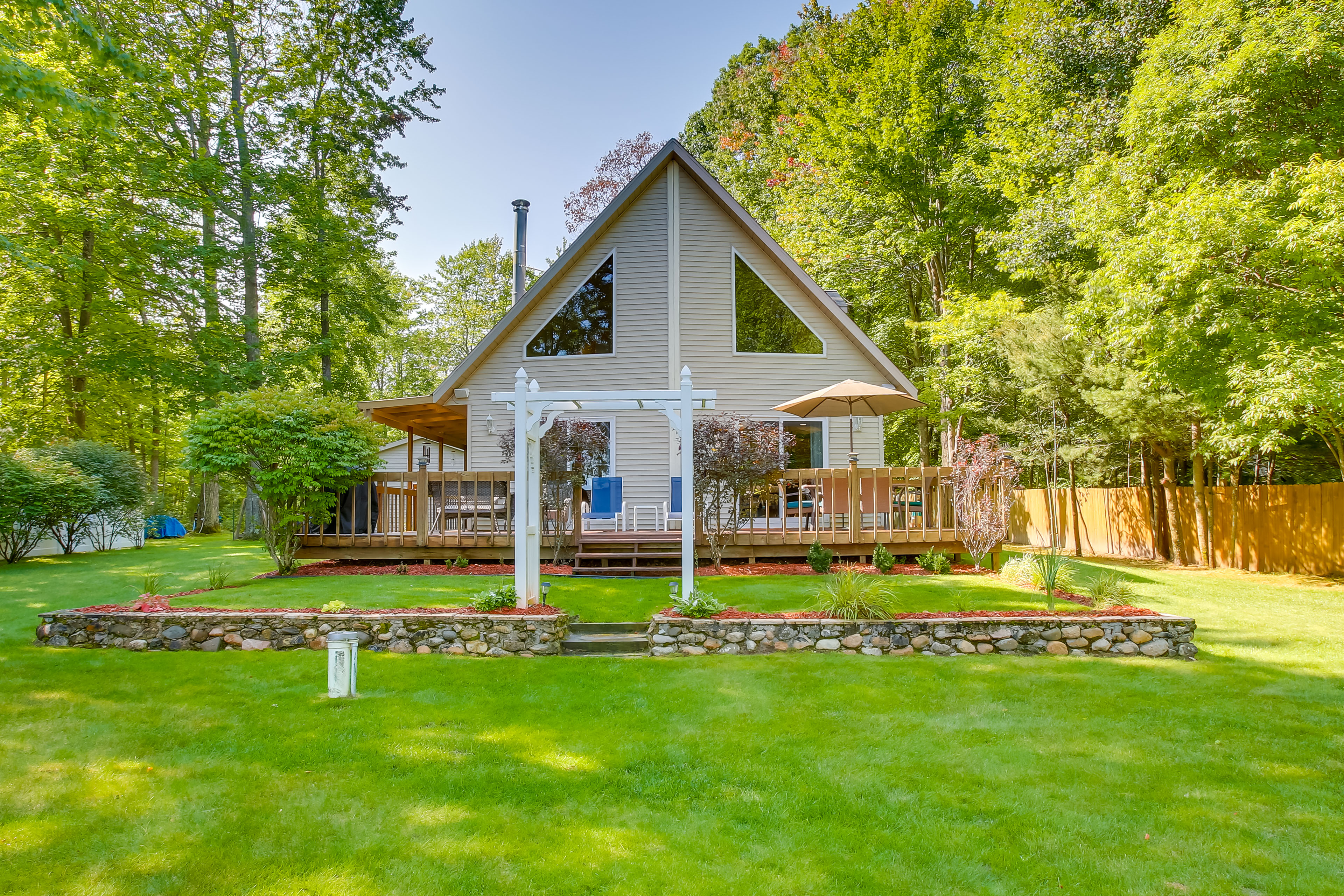 Property Image 2 - Interlochen Lake House w/ Deck, Fire Pit & Dock!