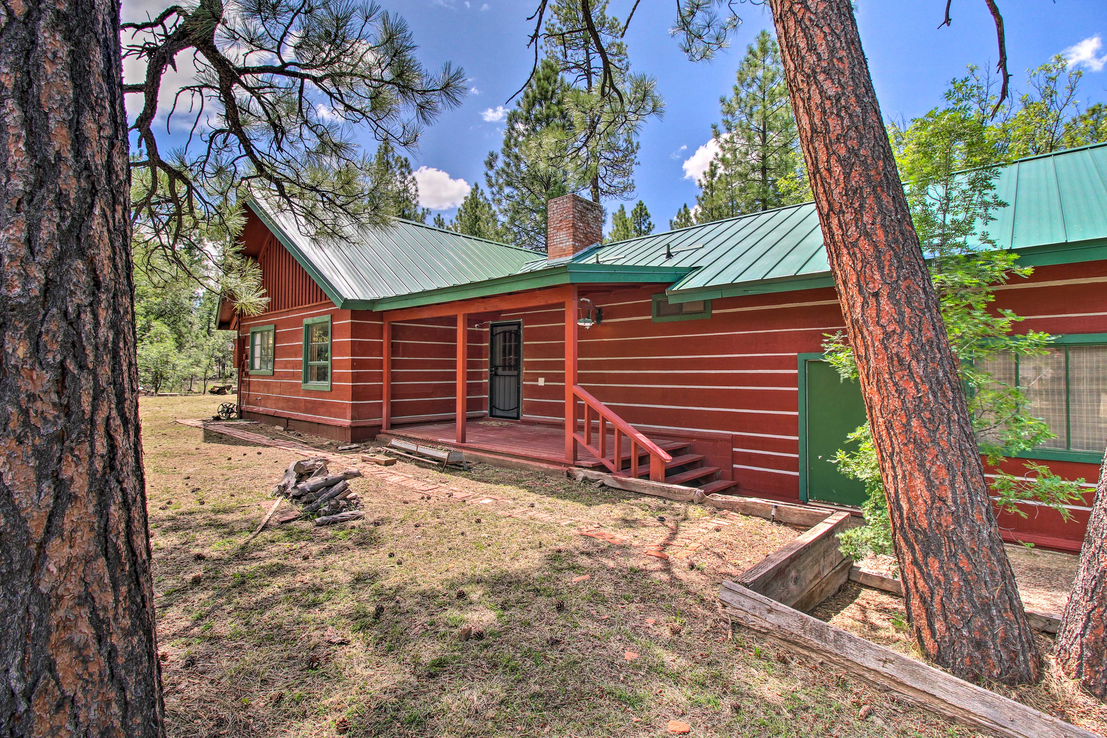 Property Image 2 - Lakeside Cabin w/ Deck < 1 Mi to Rainbow Lake!