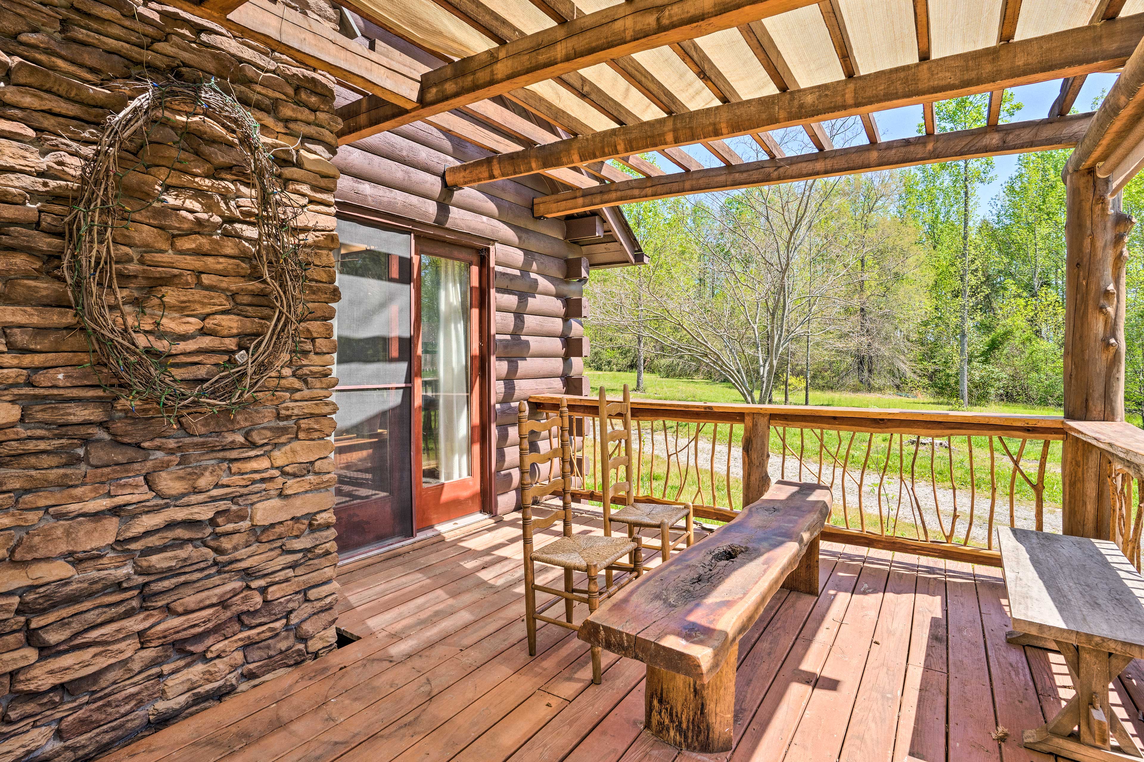 Property Image 2 - Sunny Log Cabin Retreat w/ Spacious Backyard
