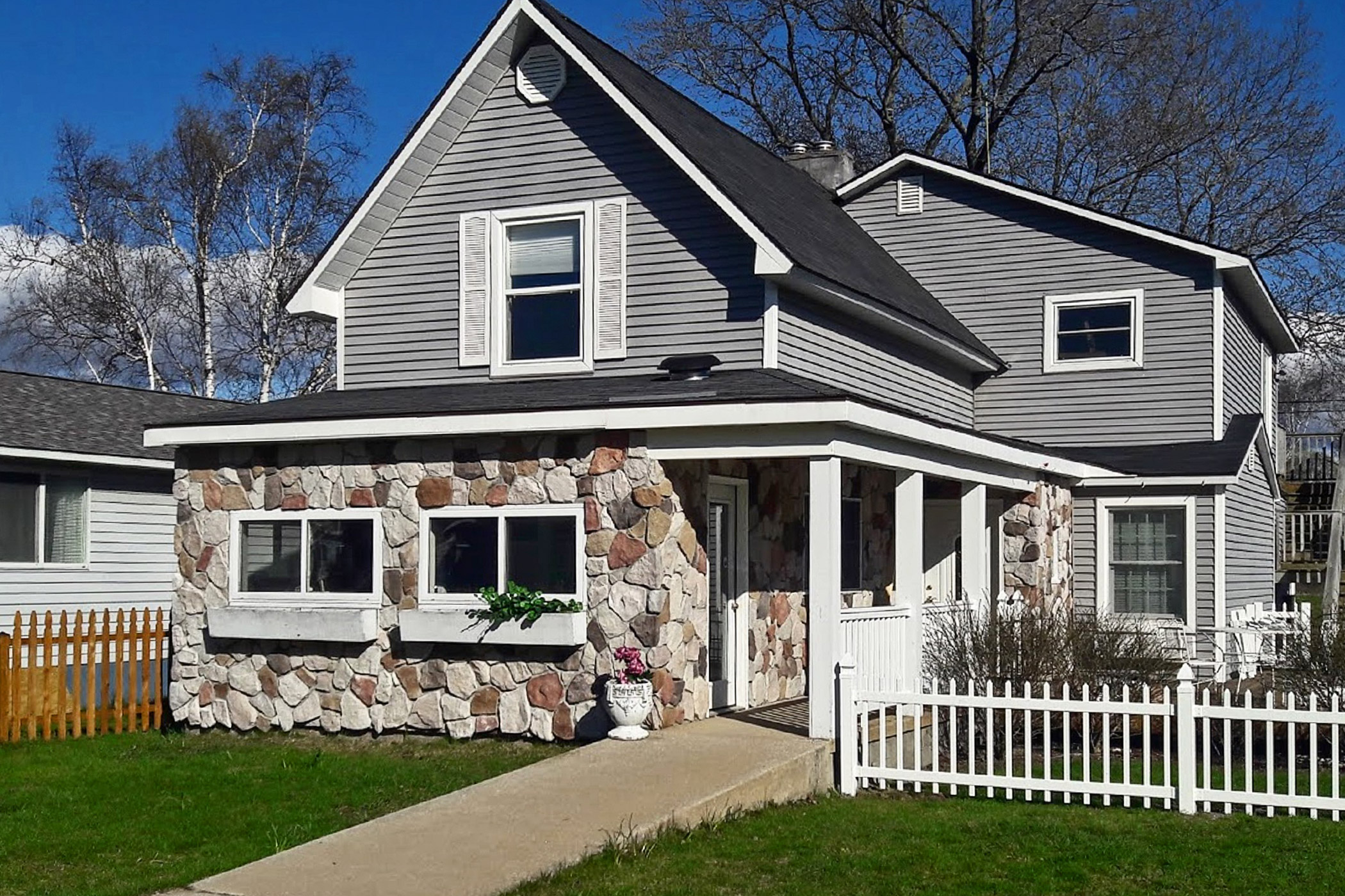 Property Image 1 - Elegant Stone Cottage: Steps to Crystal Lake Beach