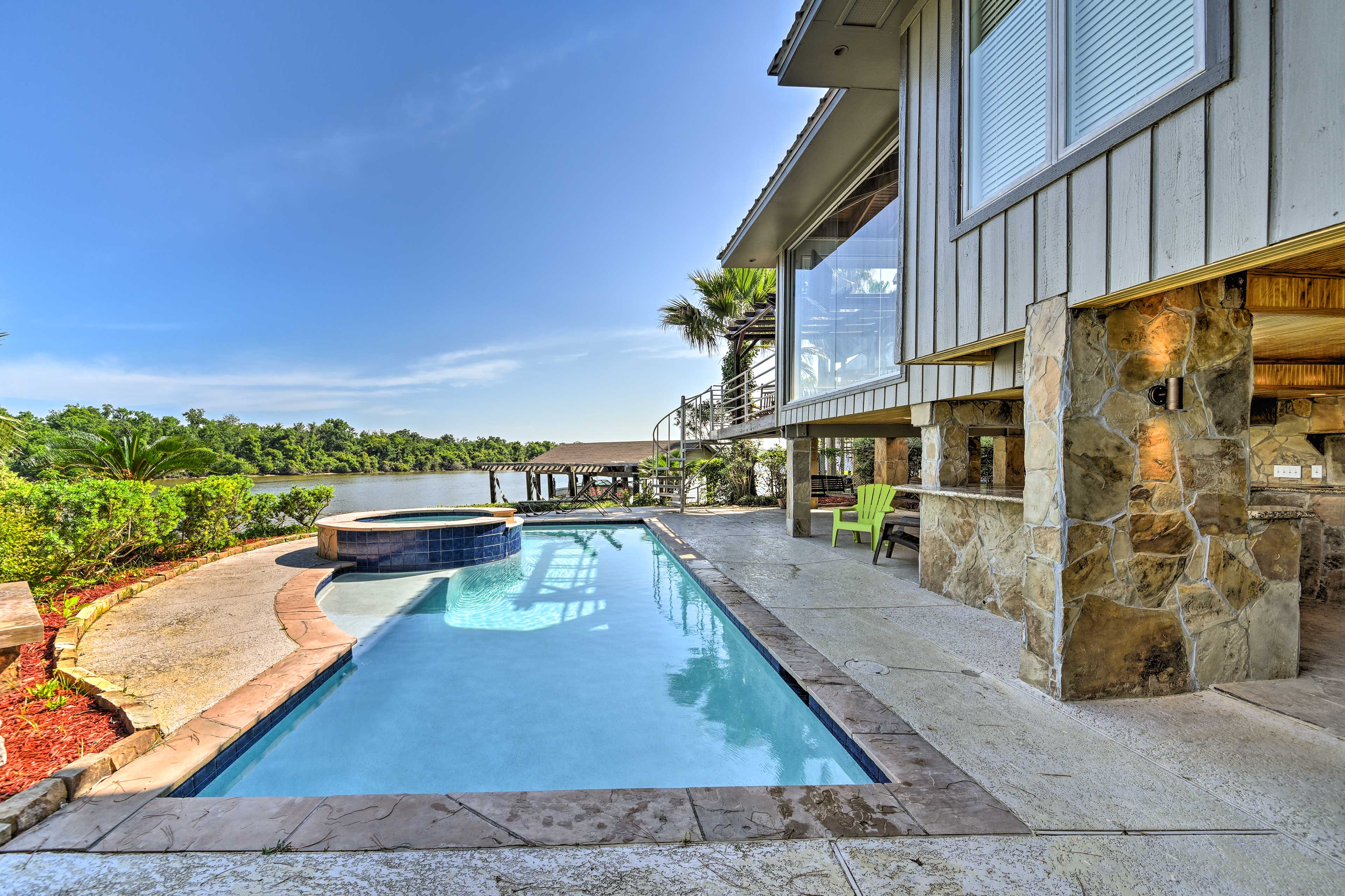 Property Image 1 - Luxe Houston Home on Riverfront w/ Pool & Hot Tub!