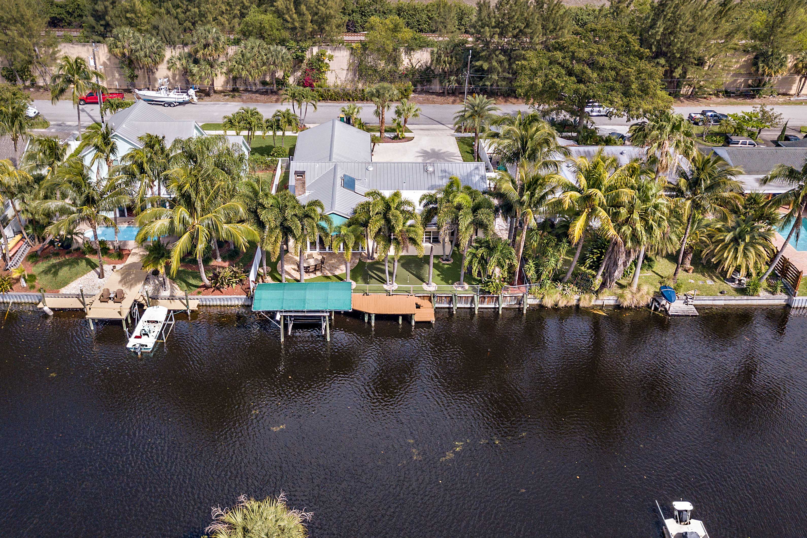 Property Image 1 - Sunny Waterfront Home by West Palm w/ Hot Tub!