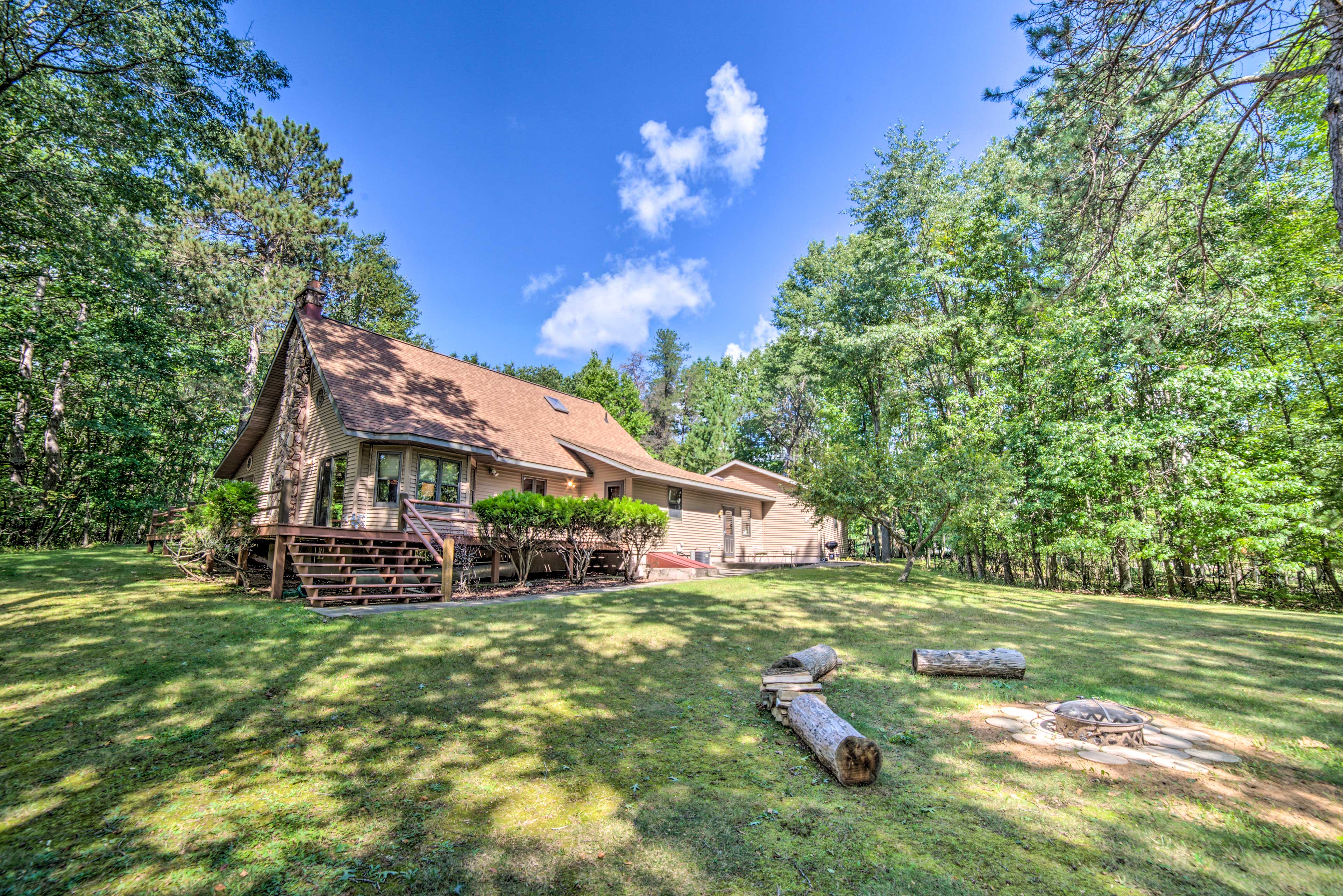 Property Image 1 - Riverfront Oconto Cabin w/ Fire Pit & Yard!