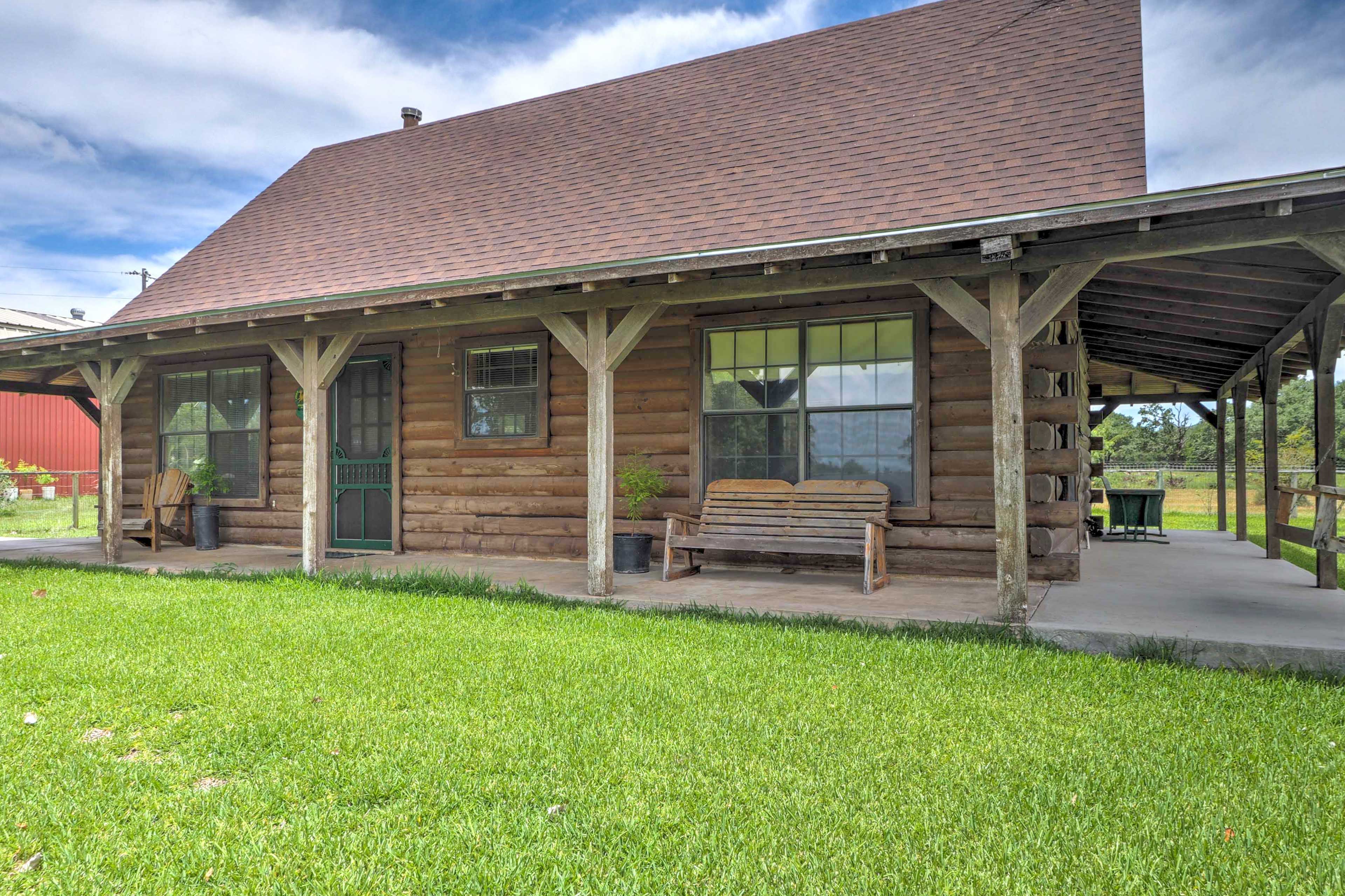 Property Image 1 - Rustic Carmine Log Cabin w/ Covered Porch on Farm!