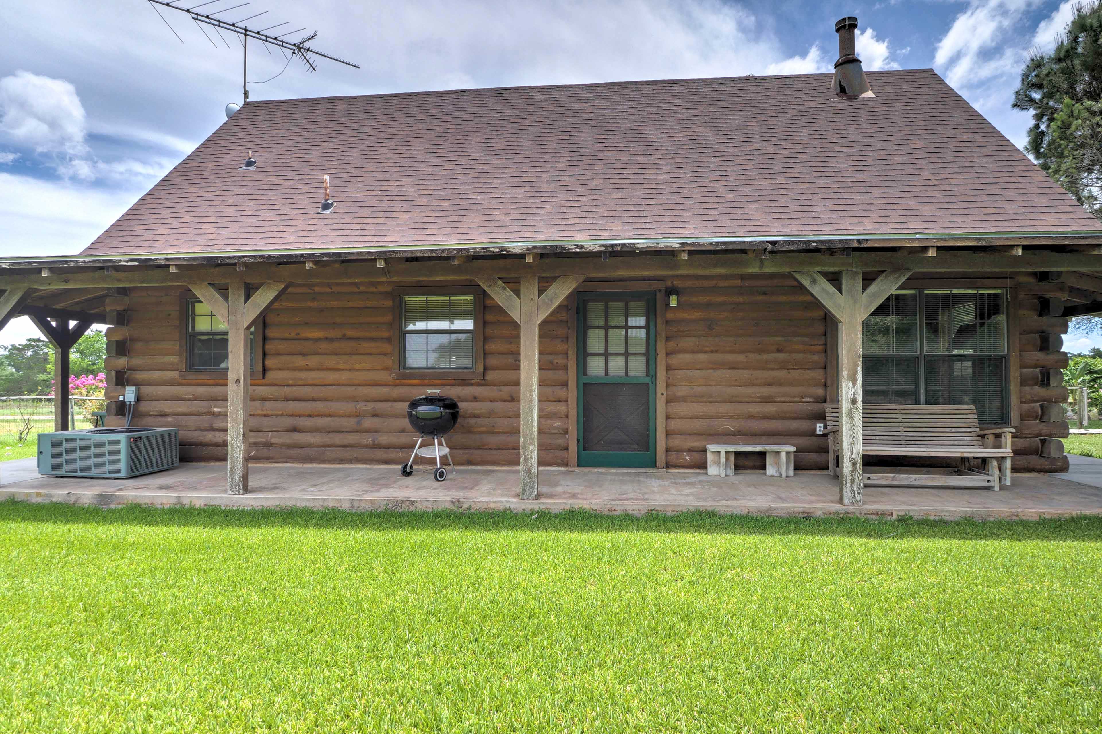 Property Image 1 - Rustic Carmine Log Cabin w/ Covered Porch on Farm!