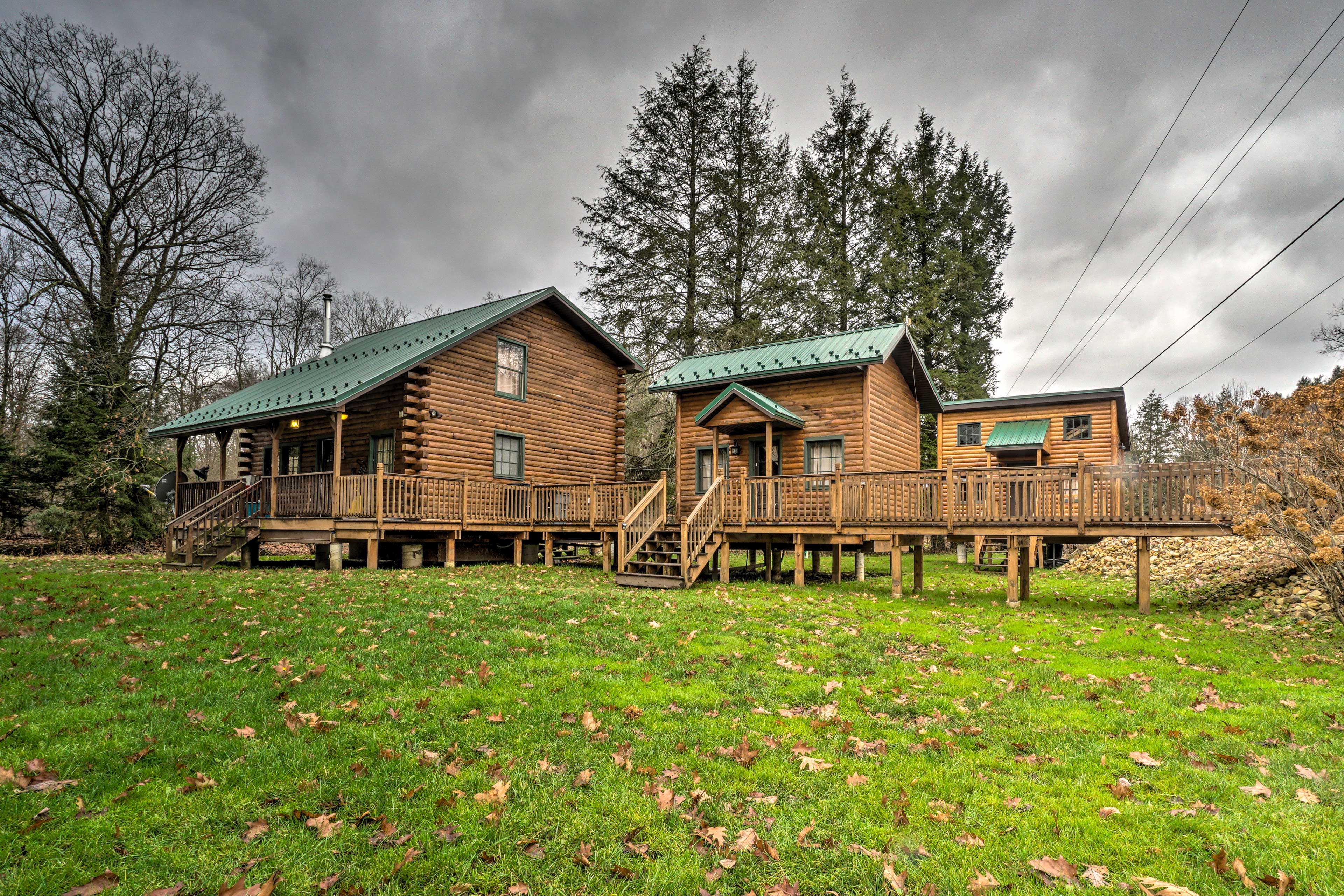 Property Image 2 - Scenic Log Cabin with Fire Pit & Stocked Creek!
