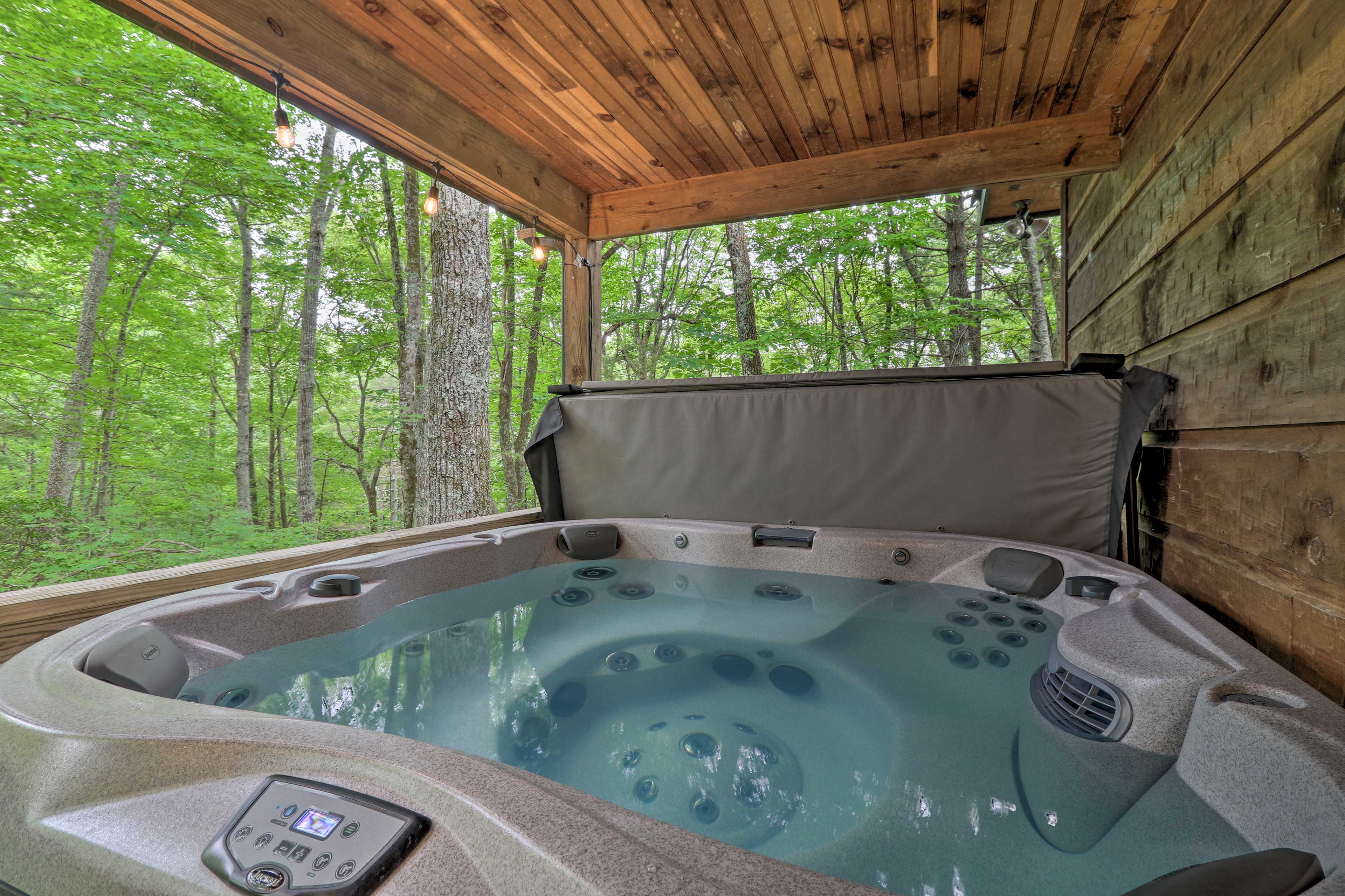 Property Image 2 - Woodland Cabin w/ Hot Tub & Deck: 11 Mi to Boone!