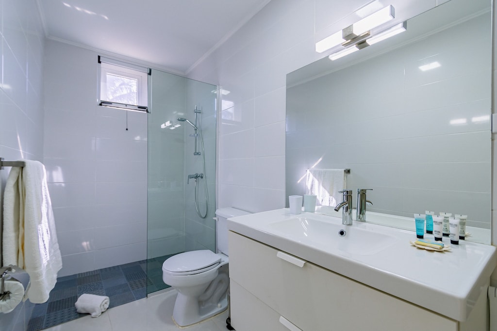 Enjoy the convenience of a walk-in shower in the second bedroom's bathroom, designed for ease and comfort.