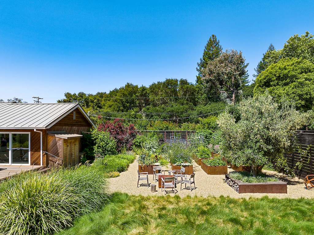 Raised beds - veggies, cut flowers, and fruit throughout summer - all for guests.