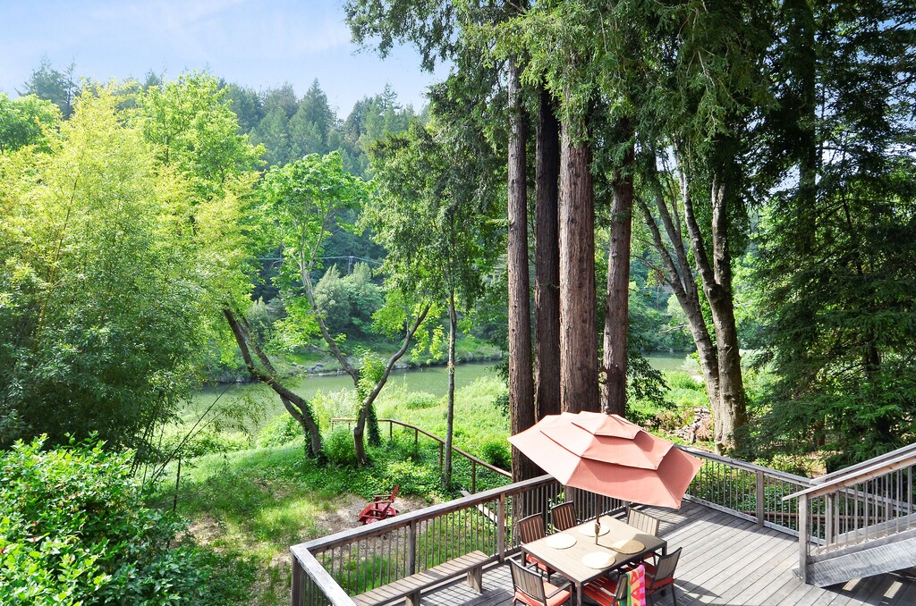 Verdant view from the upper deck - to the river and overlooking the lower deck and yard.