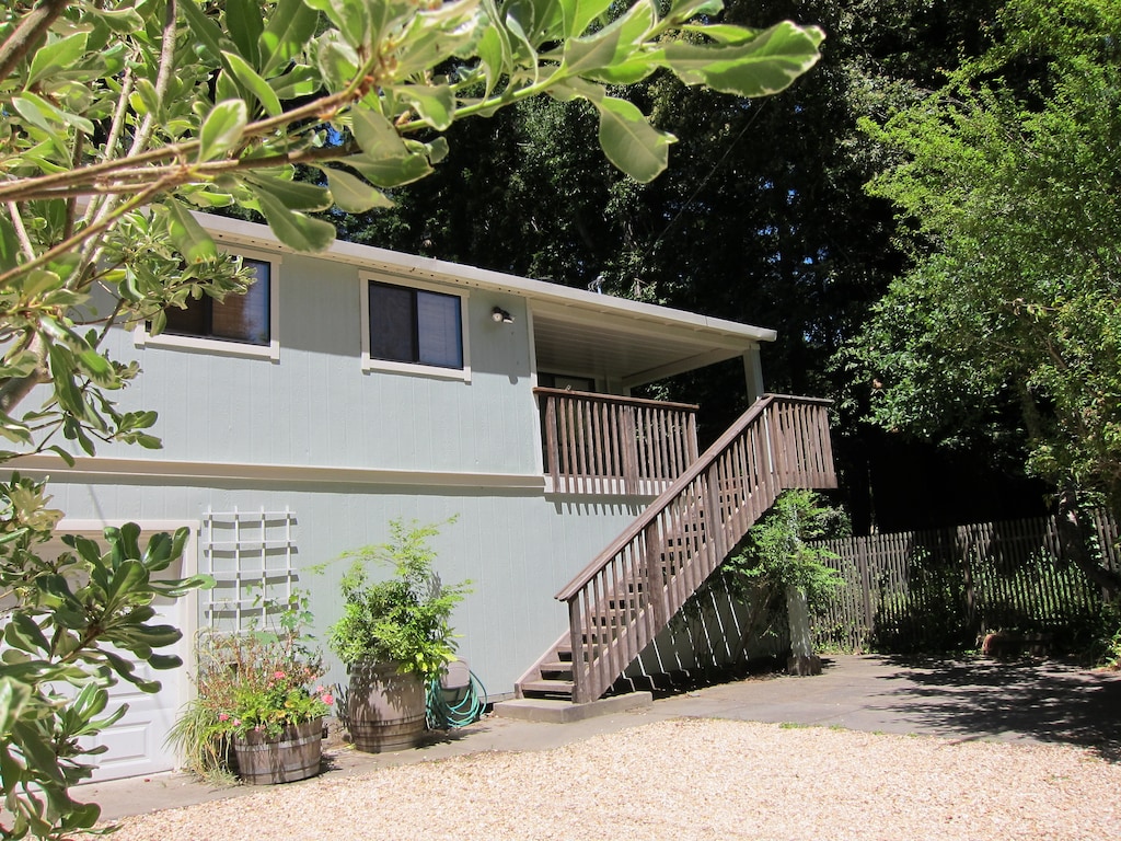 Dedicated parking for 2 to 3 cars and stairs to front door.