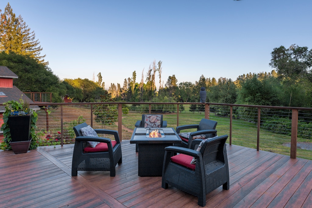 Lounge at the gas fire table on the back deck.