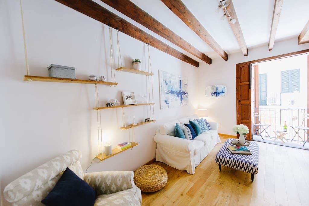 Mallorcan fabrics blend with modern living in the living room. "Charming apartment...It was brilliant. We cannot fault anything." Amy & Jack - July 2017.