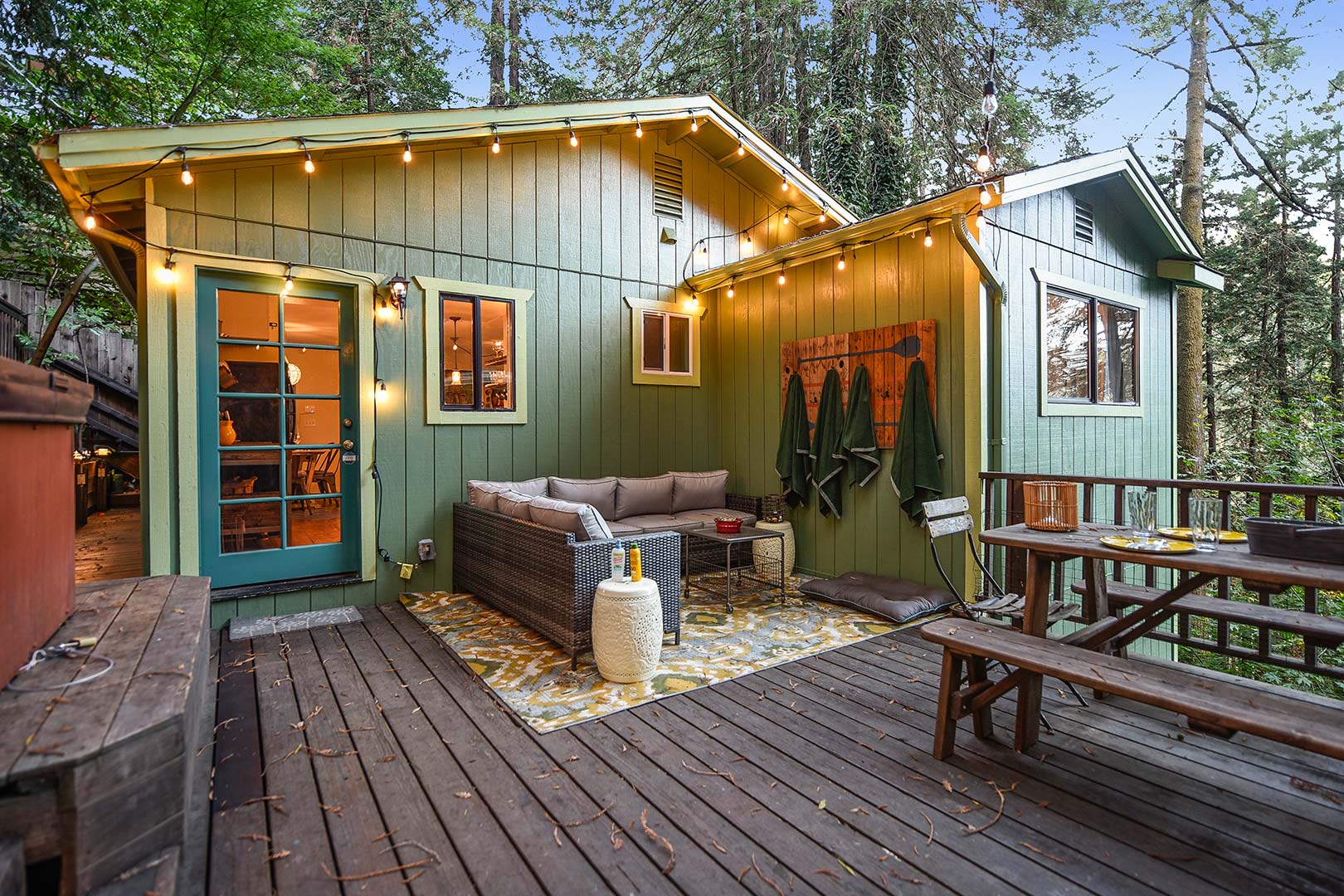 Cafe-style lighting sets a relaxing mood on your private deck.