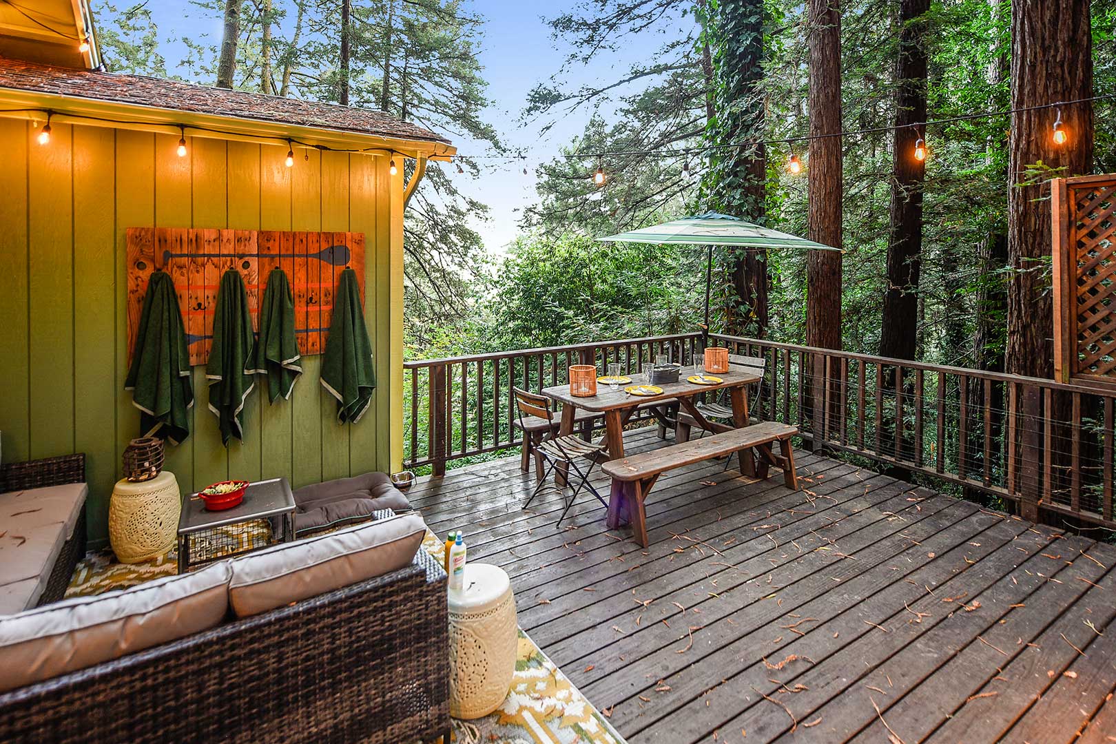 Surrounded by redwoods, you'll love every season at Artist's Perch: outdoor dining or lounging in fair weather, sitting in the hot tub anytime..