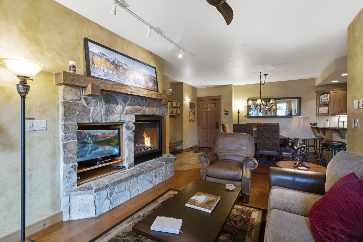 Warm up by the gas fireplace after your day on the mountain. - 