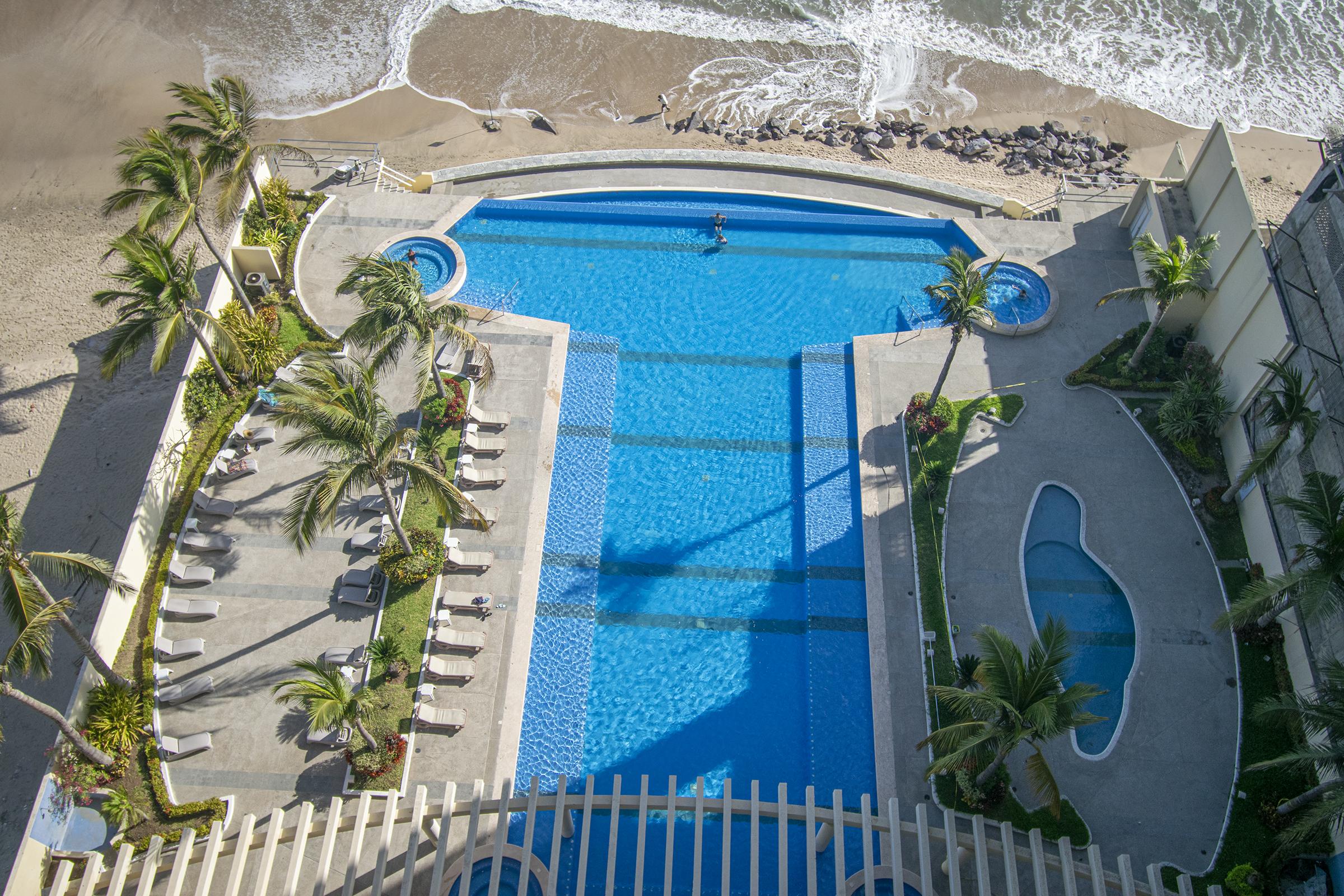 Property Image 1 - Beachfront Condo Las Gavias Golden Shores with heated Pool