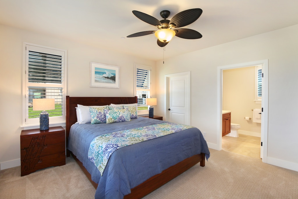 Elegant primary suite with a king bed, ensuite bathroom, and access to all the comforts of home.