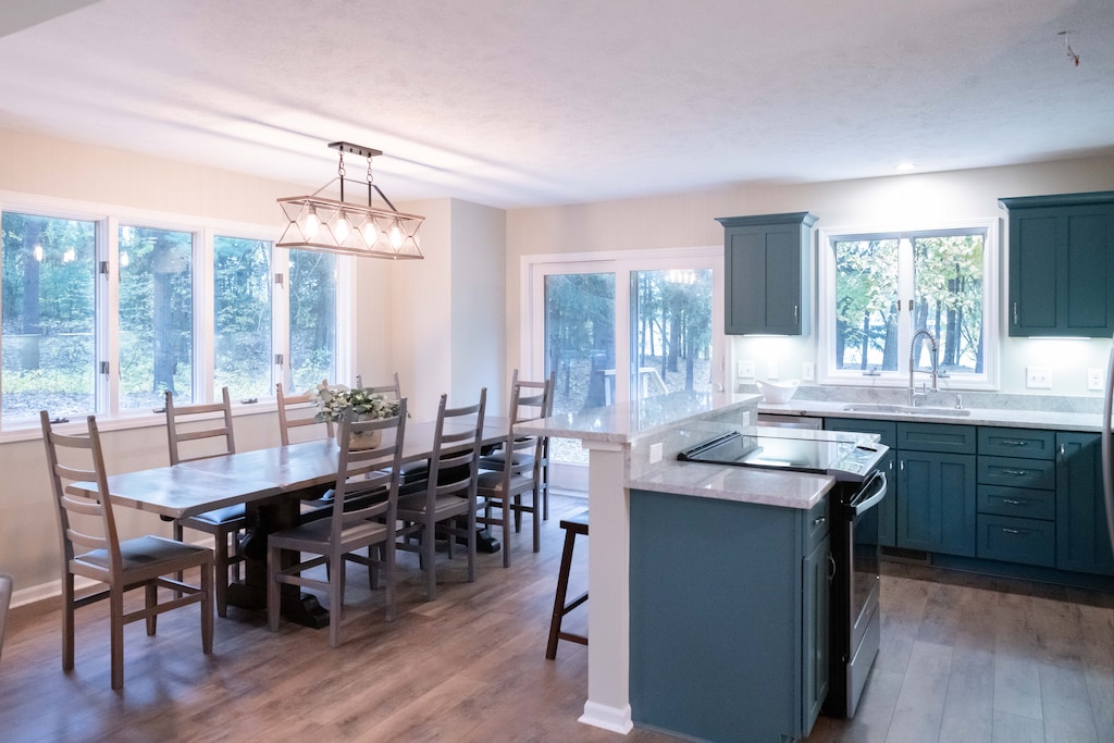 Dining area with large farmhouse table with Seating for 8
