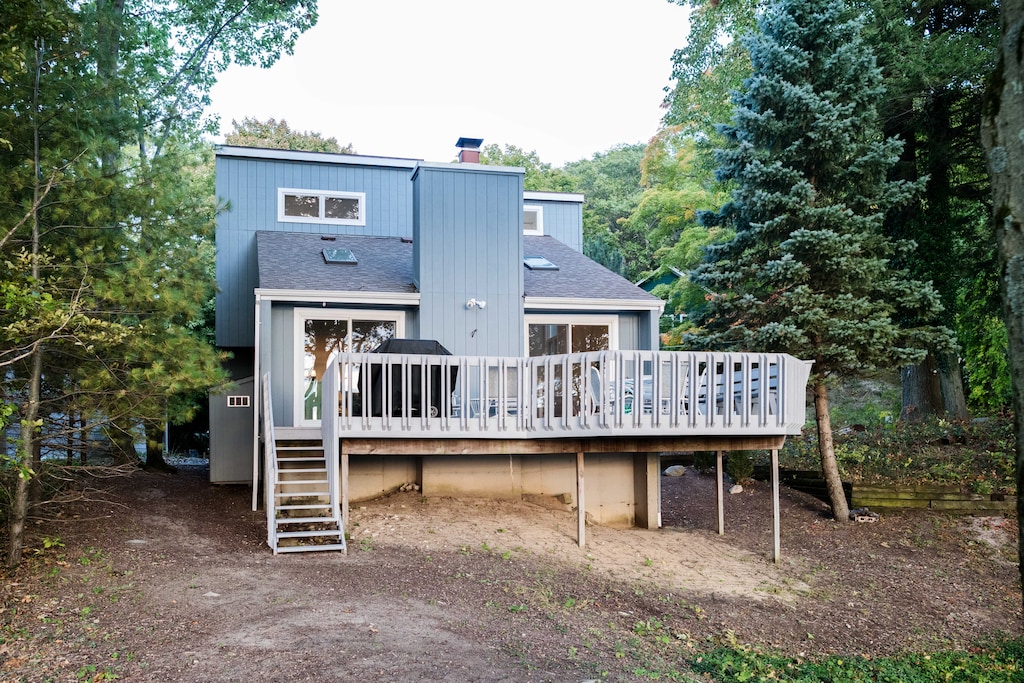 This cottage is located on Lake Michigan in the private association of Macatawa Hills.