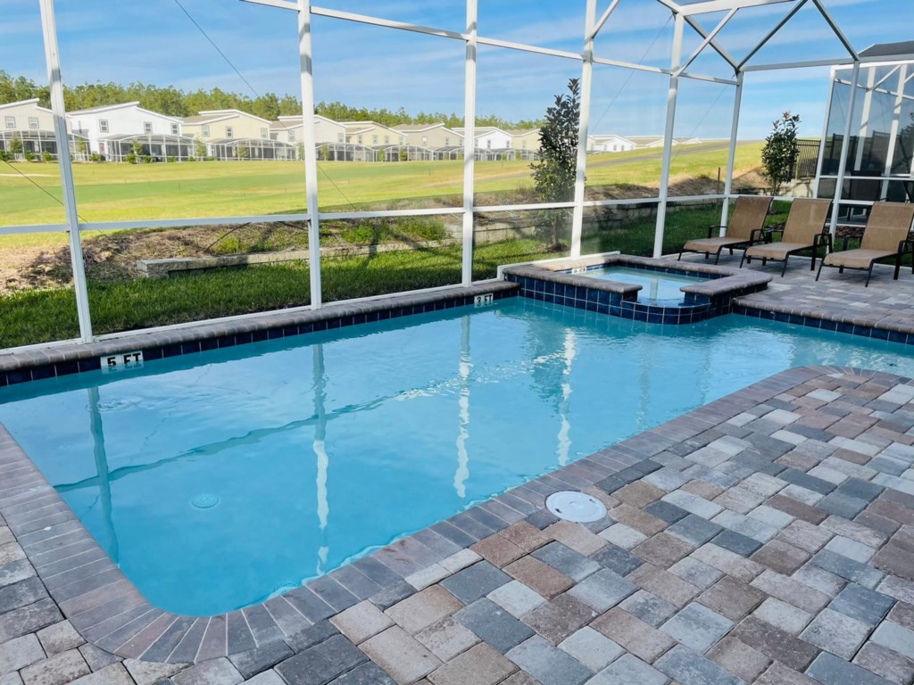 Private pool area, launge chairs and patio furniture