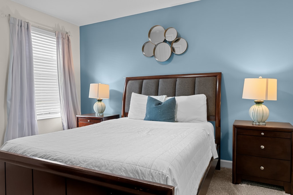 Unwind in your serene bedroom with plush bedding and stylish decor that creates the perfect retreat.