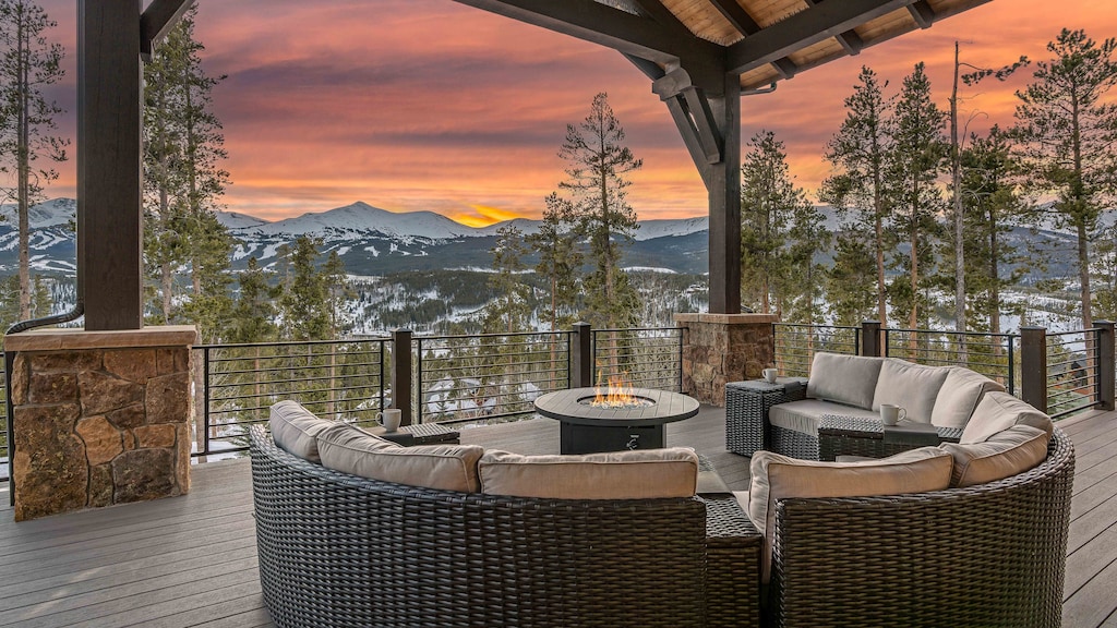 Main level deck with gas firepit, plenty of seating and views of Breckenridge Ski Resort
